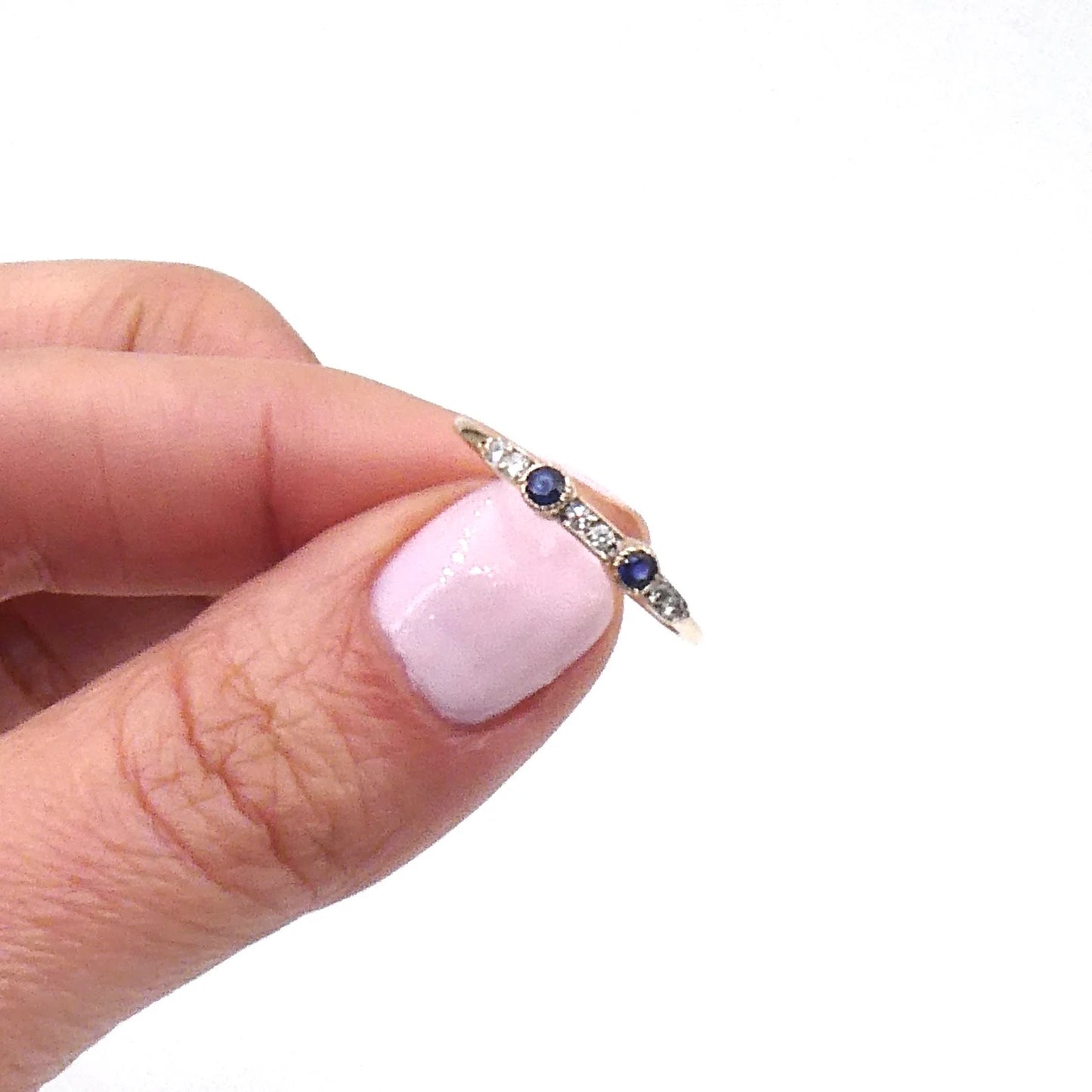 A vintage gold stacking band set with sapphires and diamonds 9kt gold.