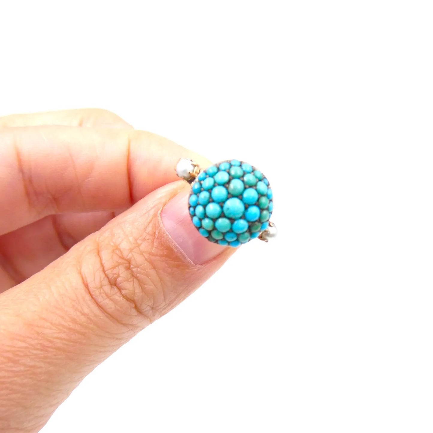 Antique turquoise bombe ring with a small pearl on either side, antique turquoise ring