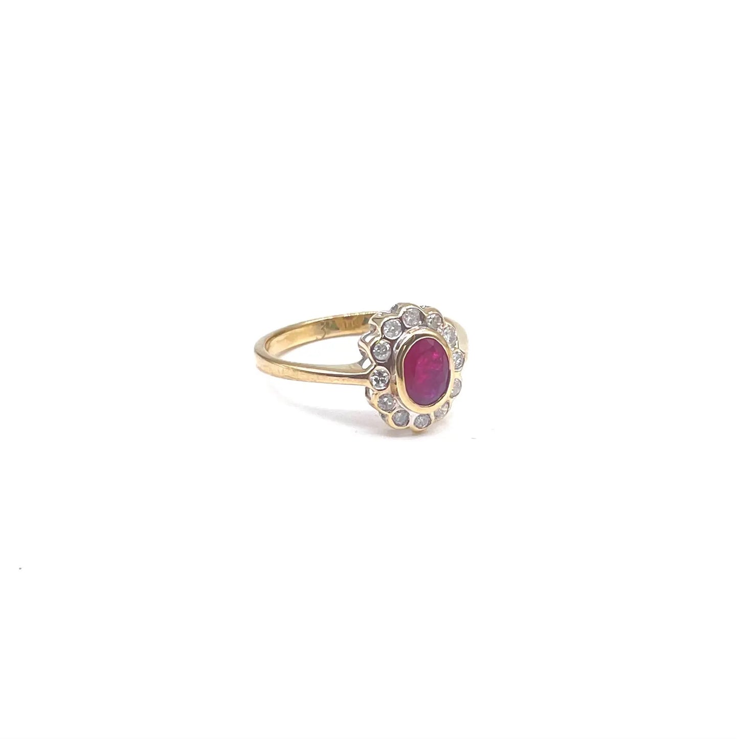 Beautiful Ruby and diamond flower ring, Ruby cluster ring with a vivid pink ruby and sparkling diamonds.