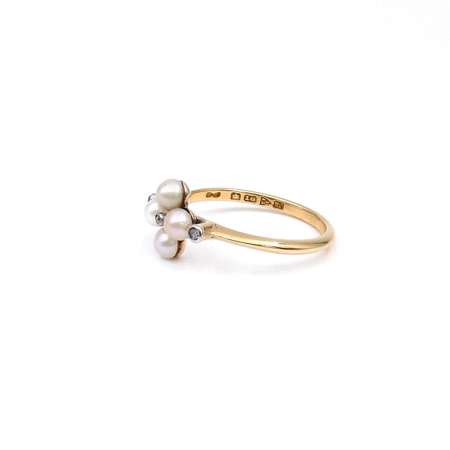 A pearl and white sapphire ring, antique pearl ring hallmarked 18kt gold Chester 1915-16. - Collected