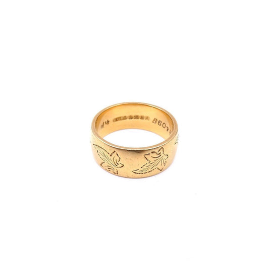A vintage heavy 18kt gold ring, engraved with a pattern of ivy leaves. - Collected