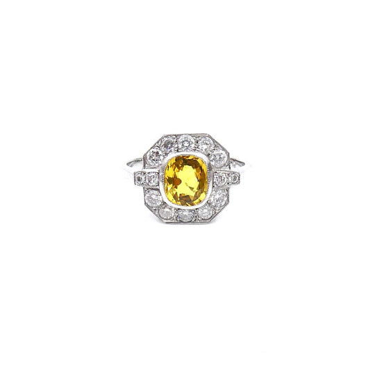 An art deco style yellow sapphire and diamond ring. - Collected