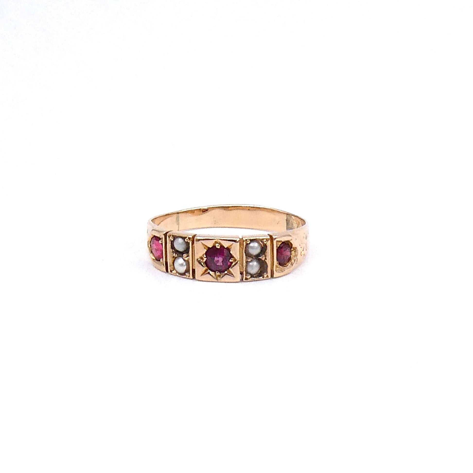Antique garnet and pearl band, set in a star and cluster setting with a floral design on the shoulders - Collected