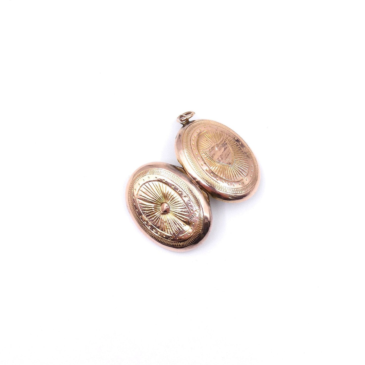 Antique locket in an oval shape, engraved rose gold locket with a shield design. - Collected