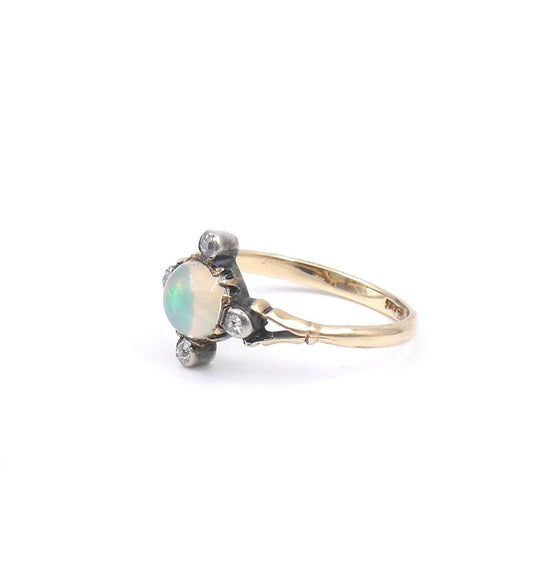 Antique opal and diamond ring, set with an iridescent opal and old cut diamonds. - Collected