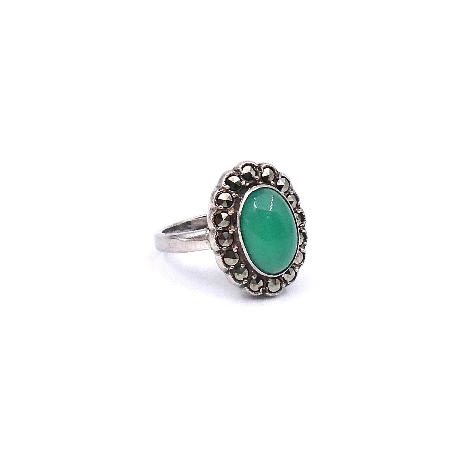 Beautiful Jade ring, featuresa cabochon of green Jade with a surrounding border of marcasite. - Collected