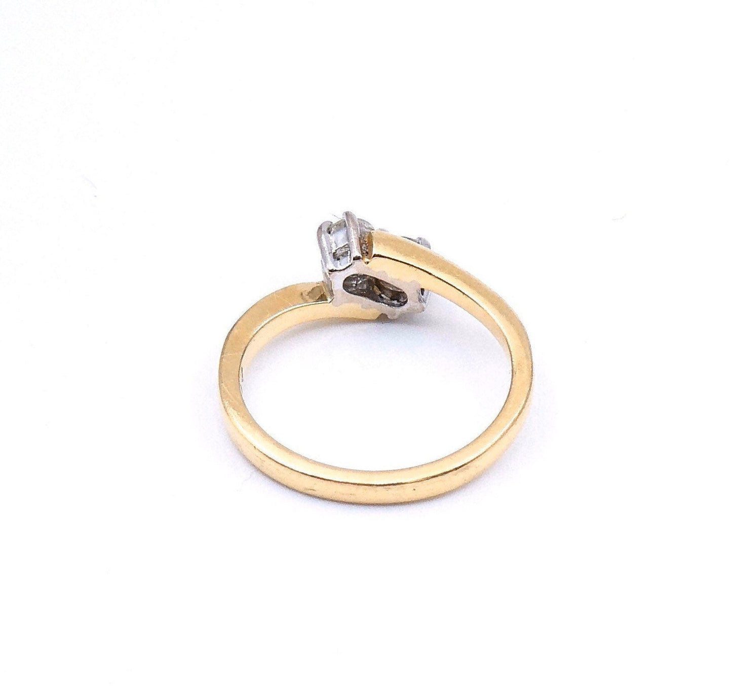 Diamond promise ring, a two stone diamond twist ring in 18kt gold a classic style. - Collected