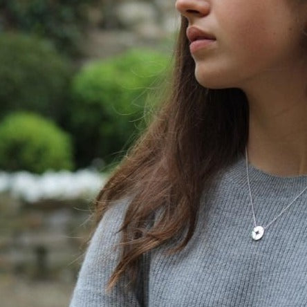 Silver cut out compass Necklace