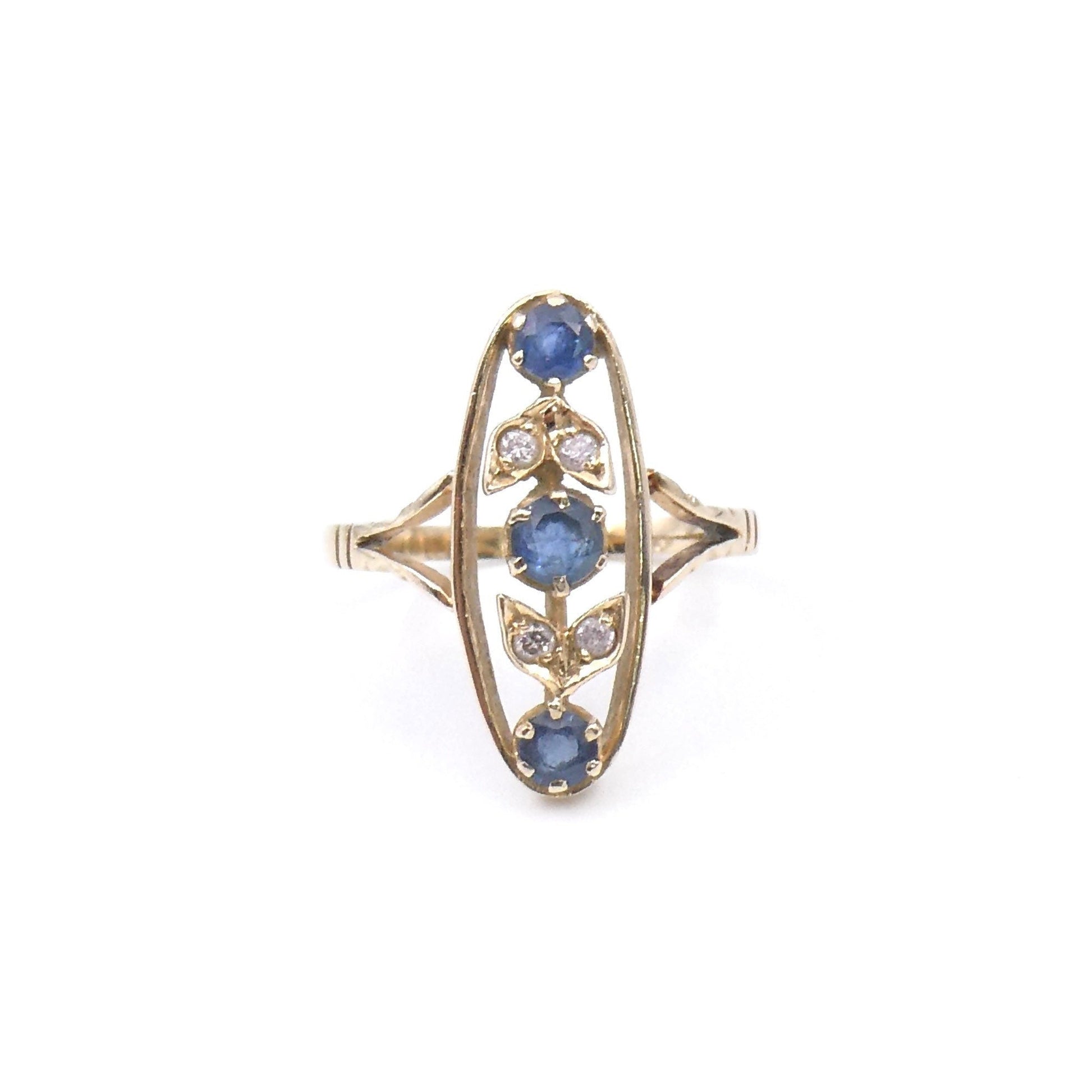 Sapphire diamond navette shaped ring, sapphire ring with diamond set leaf motifs. - Collected