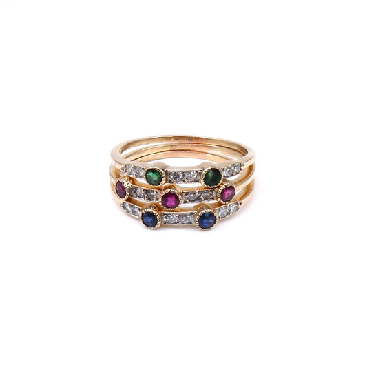 Three vintage rings set with emeralds, sapphires, rubies and diamonds. - Collected
