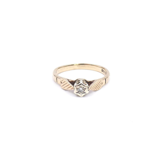 Vintage diamond solitaire ring, a small diamond ring set in 9kt gold with patterned hearts. - Collected