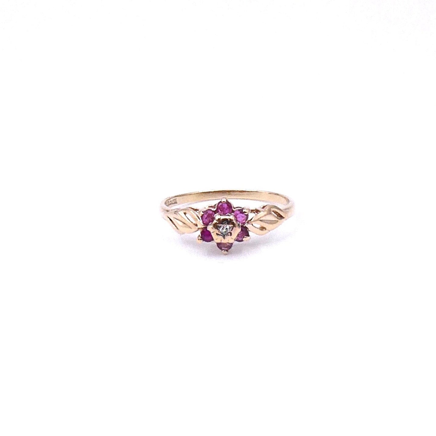 Vintage ruby diamond cluster flower ring, a delicate vintage ruby ring in 9kt gold. - Collected